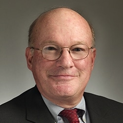 Hon. Michael J. Hogan, (Ret.)